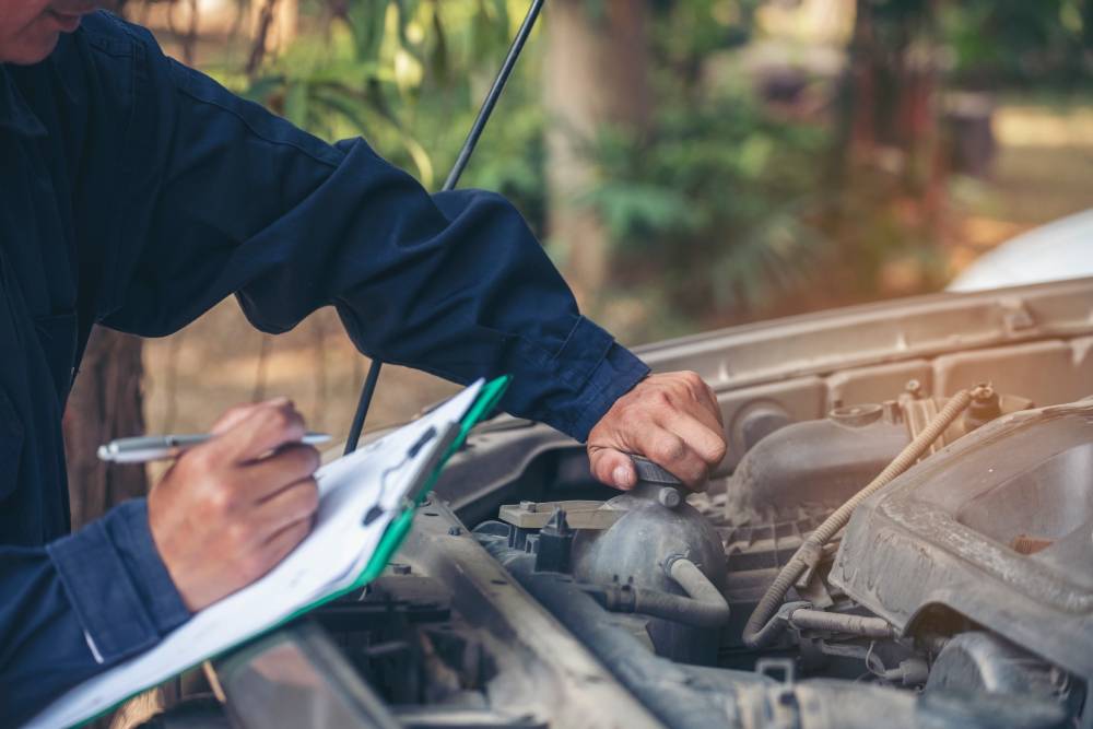 VA Safety Inspections Mechanic car service auto garage in automotive mobile center. Technician workshop repair engine motor vehicles service mechanical engineering business. Automobile mechanic hands car repairs technic